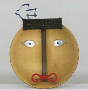 Cara de mujer con pájaro