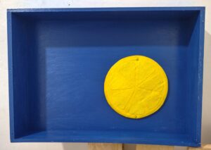 Caja de ostras azul con un trozo de limón I