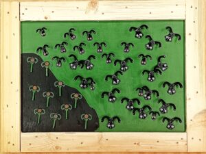 Muflones en una pradera de alta montaña